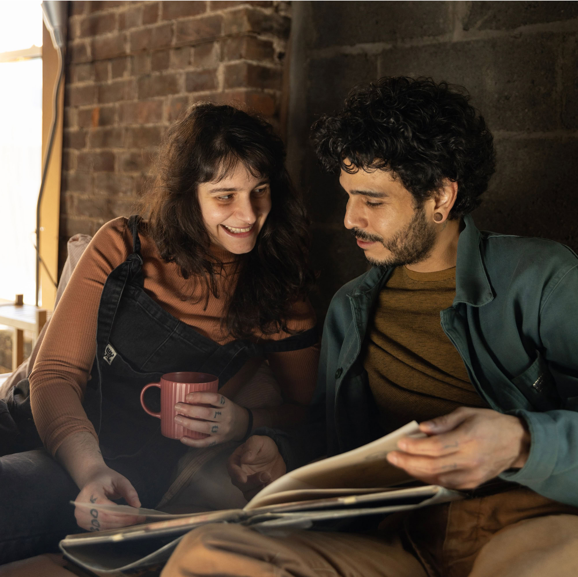 MetroPlusHealth staff member helping a member review and understand their health insurance plan options.