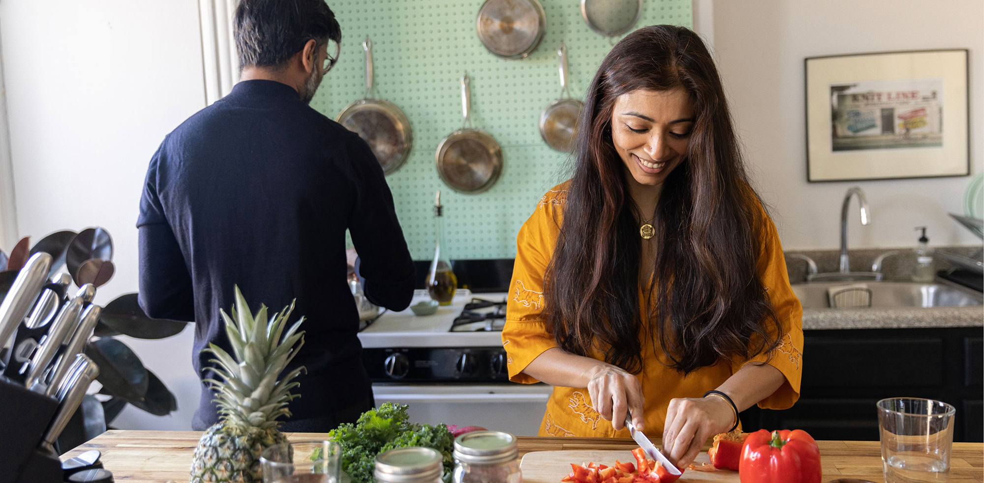 MetroPlusHealth representative helping member with insurance forms and coverage questions.