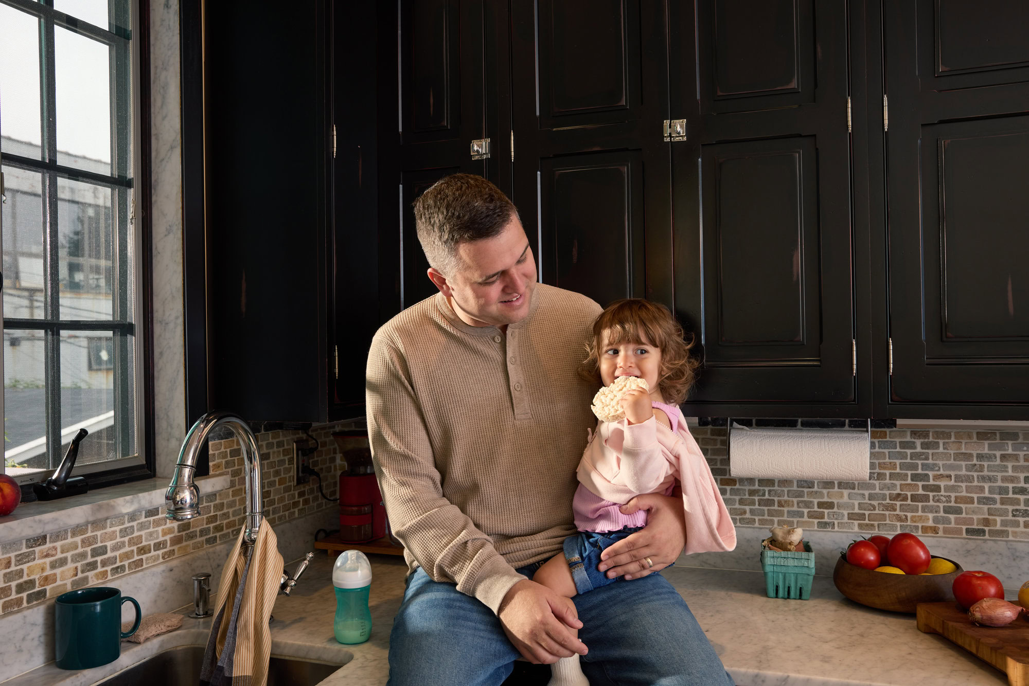 Parent and child at a medical check-up symbolizing affordable health insurance through MetroPlusHealth Child Health Plus in New York.