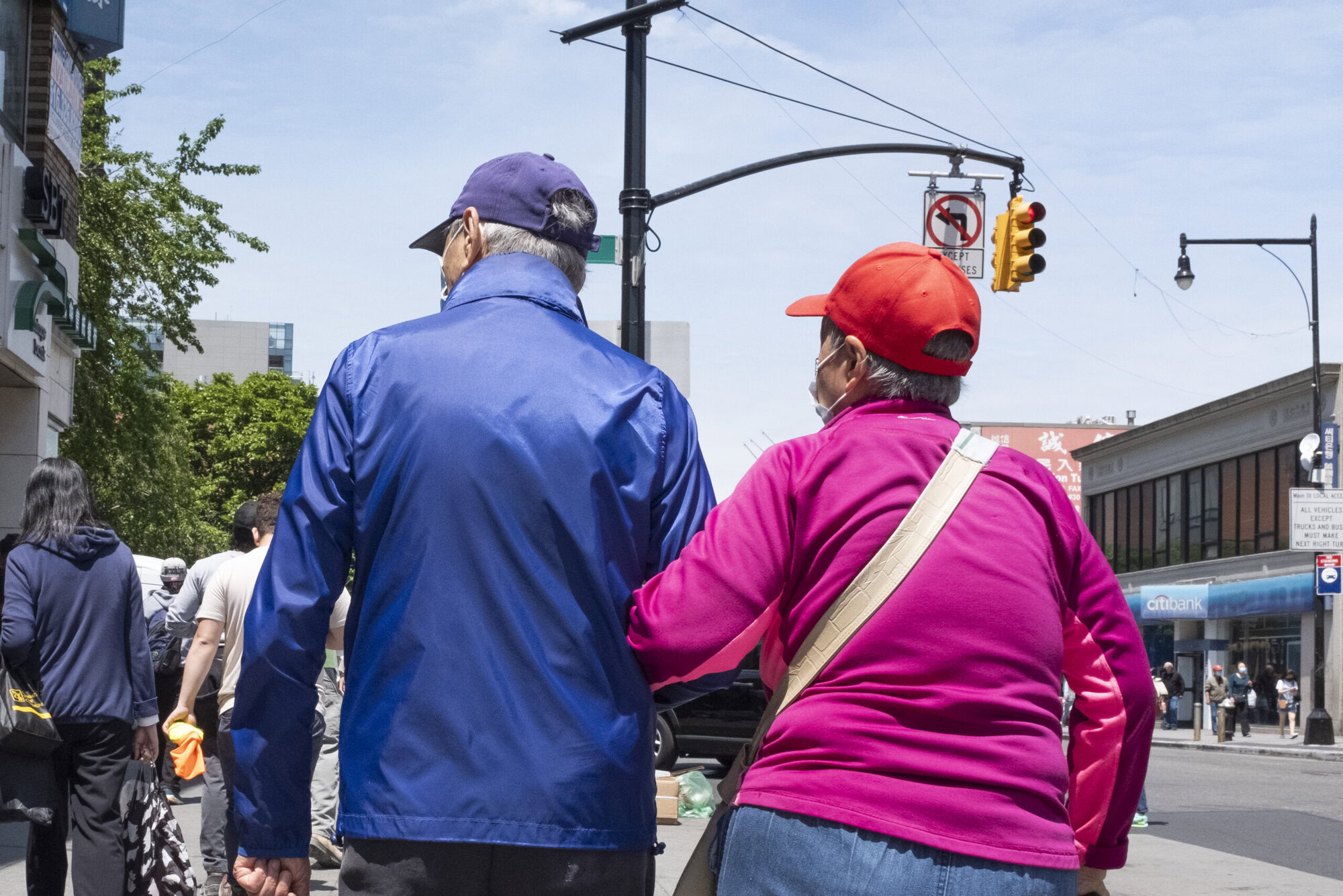MetroPlusHealth nurse helping an elderly patient at home through the Managed Long Term Care program in NYC.