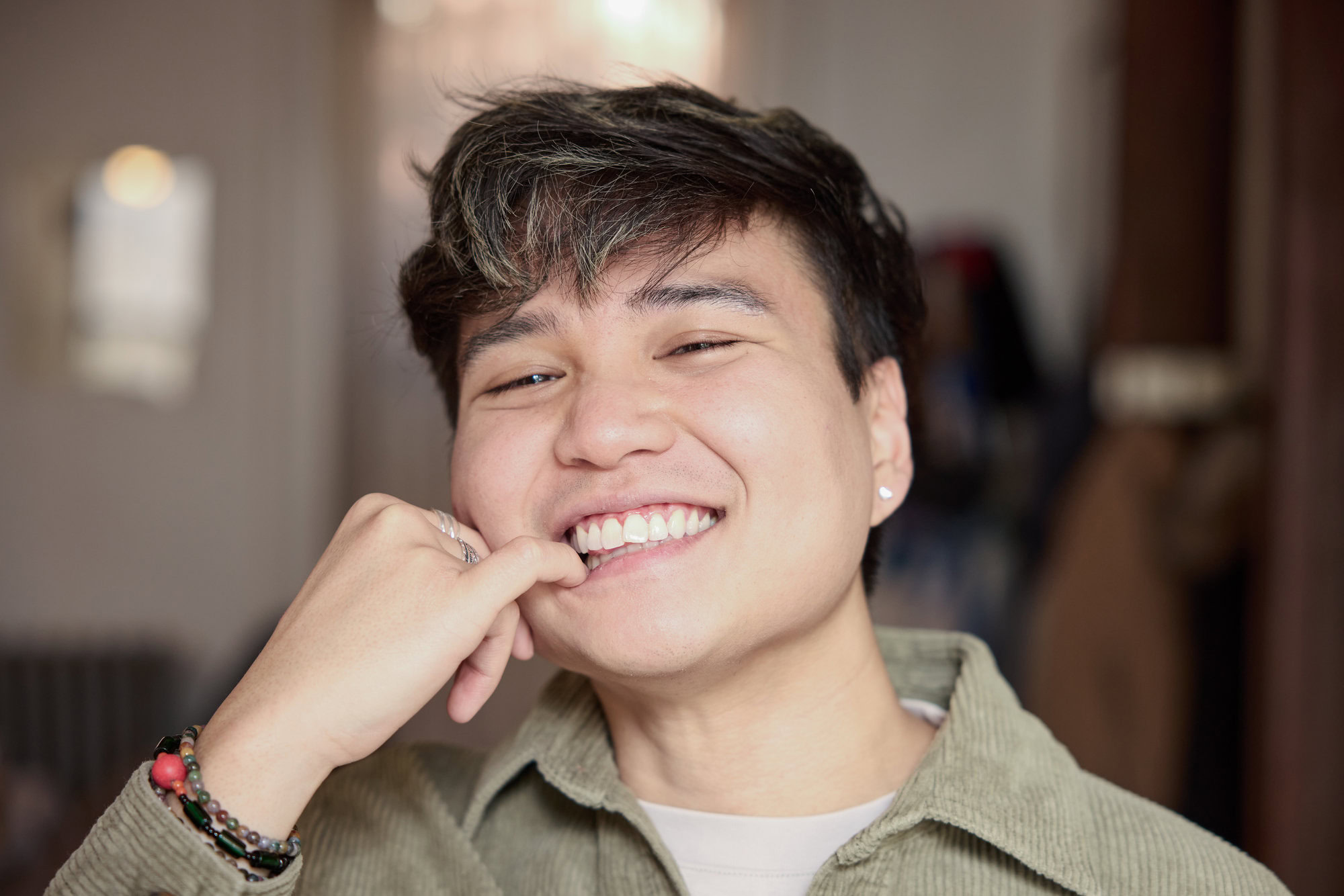 Dentist with patient reviewing MetroPlusHealth dental coverage and benefits during a check-up.