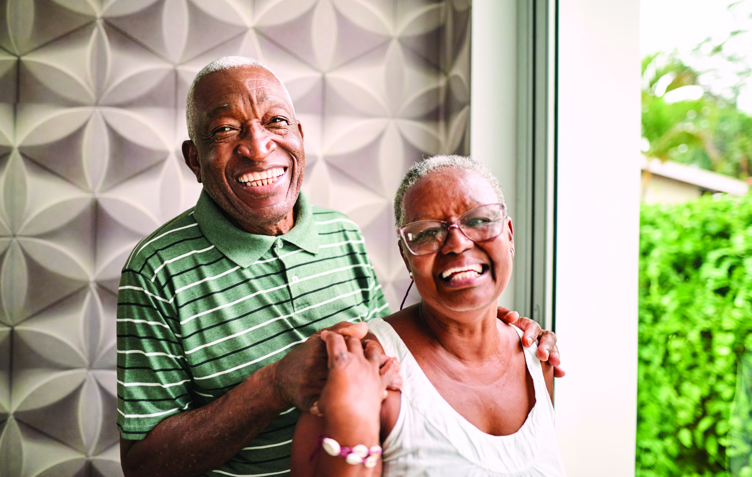 Doctor smiling with senior patient, representing MetroPlusHealth Medicare Advantage Plan in New York City.