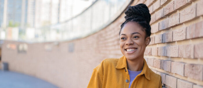 Family with doctor representing MetroPlusHealth PlatinumPlus Plan premium Marketplace coverage in New York City.