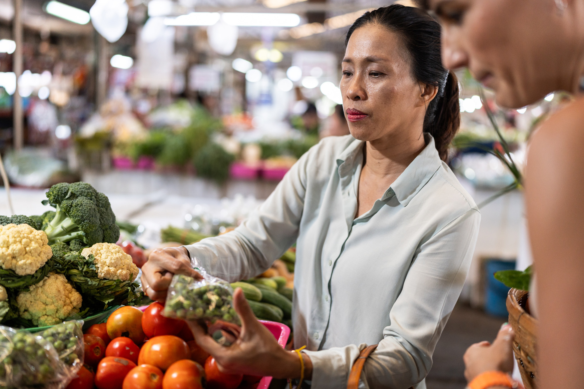 mph-woman-holding-produce
