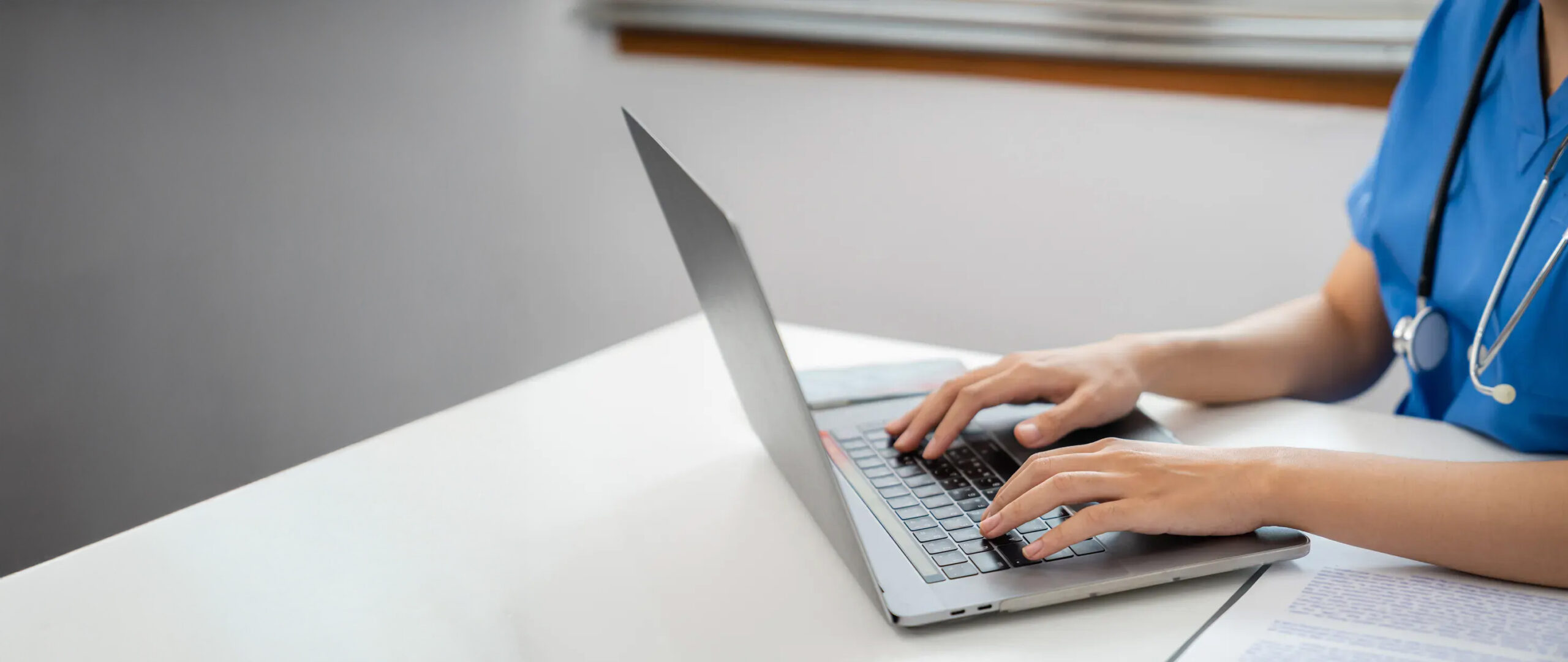 Healthcare provider reviewing pharmacy resources, medication coverage information, and prescription management tools for patient care.